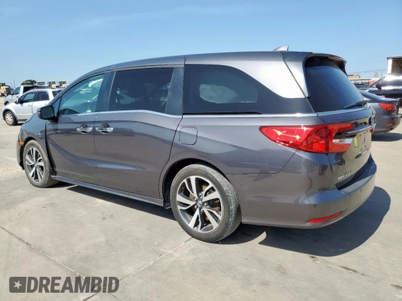 2023 Honda Odyssey Touring with VIN 5FNRL6H89PB053593, listed as a Copart auction lot 64836685 with 26,568 mi miles and Salvage title. Bid and sale history available at DreamBid. Image 2.
