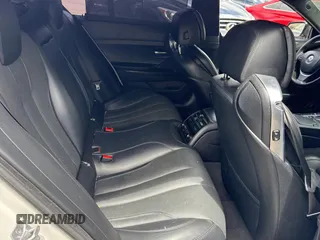 2015 BMW 6 Series 650i xDrive with VIN WBA6B4C57FD899926, listed as a Copart auction lot 54974505 with 63,570 mi miles and Salvage Title. Bid and sale history available at carsss.com. Image 6.