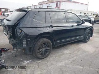 2022 Volkswagen Tiguan SE R-Line Black z VIN 3VVCB7AX6NM165794, wystawiony jako IAAI lot #42057380 z przebiegiem 25 700 mil mil oraz . Historia ofert i sprzedaży dostępna na DreamBid. Obrazek 4.