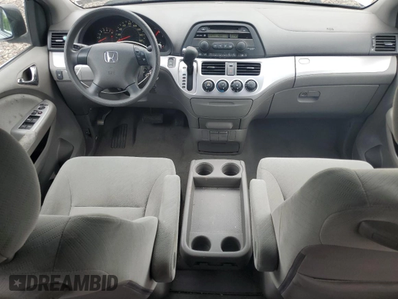 2010 Honda Odyssey LX with VIN 5FNRL3H2XAB059078, listed as a Copart auction lot 61144895 with 116,724 mi miles and Salvage title. Bid and sale history available at DreamBid. Image 8.