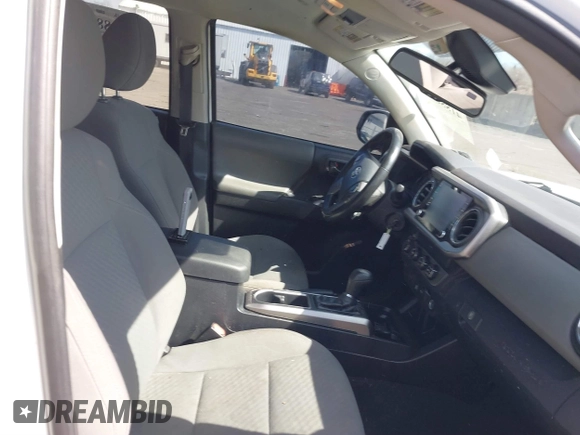 2020 Toyota Tacoma SR5 with VIN 3TMCZ5AN5LM339977, listed as a IAAI auction lot 41886937 with 94,986 mi miles and . Bid and sale history available at DreamBid. Image 5.