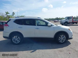 2016 Nissan Rogue S with VIN KNMAT2MV7GP618804, listed as a IAAI auction lot 41634599 with 123,859 mi miles. Bid and sale history available at carsss.com. Image 13.