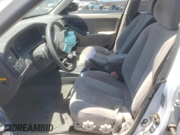 2006 Hyundai Elantra GLS with VIN KMHDN46D96U288604, listed as a Copart auction lot 58603915 with 92,518 mi miles and Salvage title. Bid and sale history available at DreamBid. Image 7.