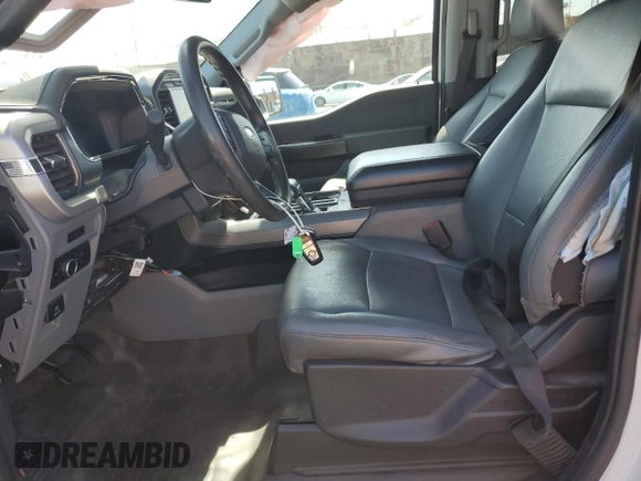 2023 Ford F-150 Lightning Pro с VIN 1FTVW1EL2PWG13712, выставлен на аукционе Copart как лот 56950955 с пробегом 60 605 миль миль и Списание • Salvage title. История ставок и продаж доступна на DreamBid. Изображение 7.