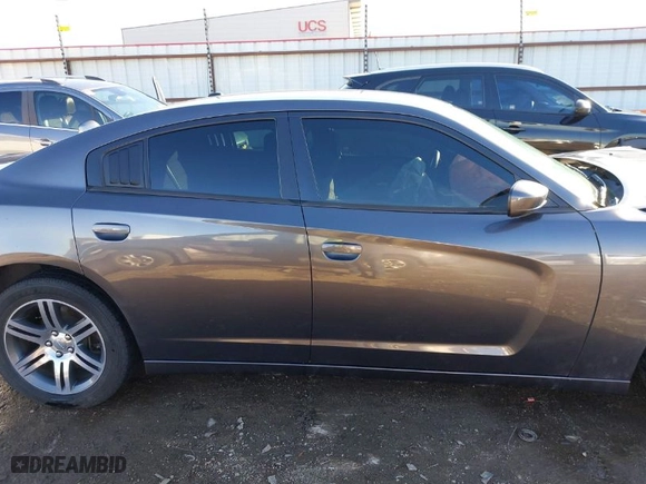 2014 Dodge Charger SXT with VIN 2C3CDXHG7EH325117, listed as a IAAI auction lot 41482634 with 106,761 mi miles. Bid and sale history available at carsss.com. Image 14.