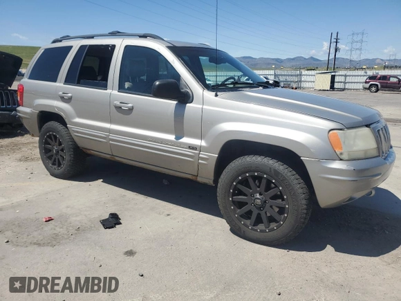 2001 Jeep Grand Cherokee Limited with VIN 1J4GW58N11C568908, listed as a Copart auction lot 55697175 with 214,491 mi miles and Clean Title. Bid and sale history available at DreamBid. Image 4.