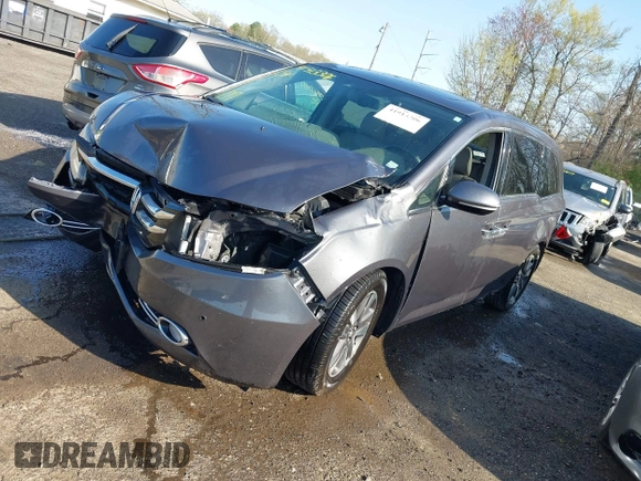 2015 Honda Odyssey Touring Elite z VIN 5FNRL5H9XFB067679, wystawiony jako IAAI lot #41913306 z przebiegiem 199 482 mil mil oraz . Historia ofert i sprzedaży dostępna na DreamBid. Obrazek 2.