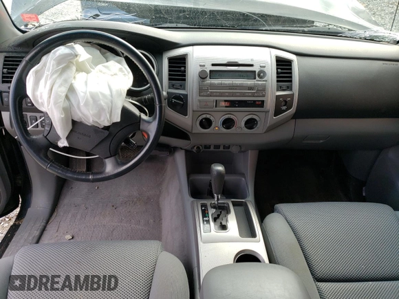 2009 Toyota Tacoma with VIN 5TEUU42N39Z660570, listed as a Copart auction lot 52025513 with 106,815 mi miles and Salvage title. Bid and sale history available at DreamBid. Image 8.
