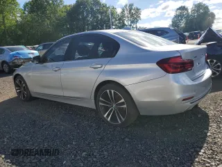 2018 BMW 3 Series 330i xDrive with VIN WBA8D9G50JNU67630, listed as a Copart auction lot 57558615 with 73,784 mi miles and Salvage title. Bid and sale history available at DreamBid. Image 2.