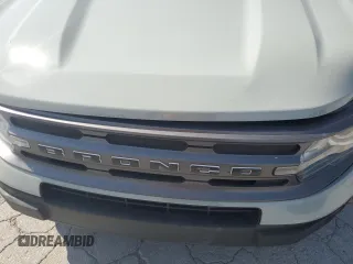 2022 Ford Bronco Sport Big Bend z VIN 3FMCR9B64NRE04995, wystawiony jako Copart lot #53064825 z przebiegiem 32 739 mil mil oraz Czysty tytuł • Clean title. Historia ofert i sprzedaży dostępna na DreamBid. Obrazek 13.