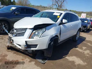 2014 Cadillac SRX Performance Collection with VIN 3GYFNCE38ES675508, listed as a IAAI auction lot 41969292 with 147,534 mi miles and . Bid and sale history available at DreamBid. Image 18.
