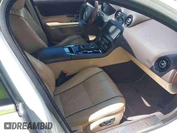2015 Jaguar XJ with VIN SAJWA1CZ0F8V75119, listed as a IAAI auction lot 42248663 with 94,060 mi miles and . Bid and sale history available at DreamBid. Image 5.