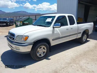 2000 Toyota Tundra SR5 with VIN 5TBRT3413YS097893, listed as a IAAI auction lot 42221710 with 213,142 mi miles and . Bid and sale history available at DreamBid. Image 2.