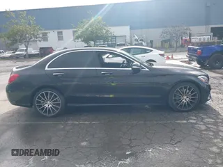 2015 Mercedes-Benz C-Class C 300 Luxury with VIN 55SWF4KB0FU061257, listed as a IAAI auction lot 41573625 with 87,736 mi miles. Bid and sale history available at carsss.com. Image 13.