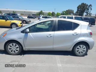 2014 Toyota Prius One with VIN JTDKDTB38E1061202, listed as a IAAI auction lot 42044747 with 133,409 mi miles and . Bid and sale history available at DreamBid. Image 14.