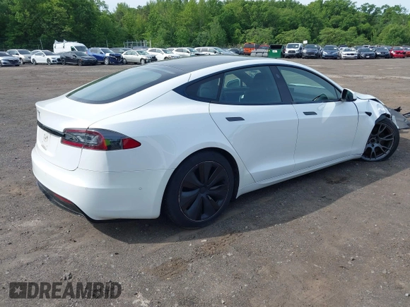 2022 Tesla Model S with VIN 5YJSA1E58NF467644, listed as a IAAI auction lot 42344403 with 52,628 mi miles and . Bid and sale history available at DreamBid. Image 4.