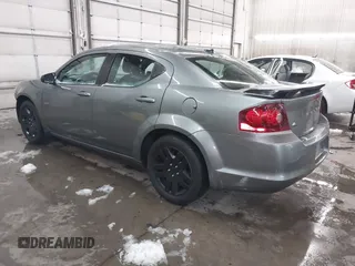 2013 Dodge Avenger SE with VIN 1C3CDZAB1DN581303, listed as a IAAI auction lot 41942469 with 123,330 mi miles. Bid and sale history available at carsss.com. Image 3.