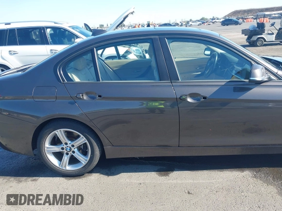 2014 BMW 3 Series 328i with VIN WBA3C1C57EK116483, listed as a IAAI auction lot 42697759 with 113,010 mi miles and . Bid and sale history available at DreamBid. Image 18.