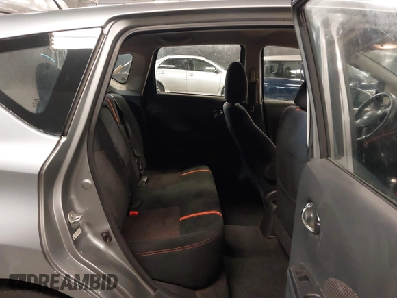 2015 Nissan Note SV with VIN 3N1CE2CP0FL400447, listed as a IAAI auction lot 41669498 with 96,699 mi miles and . Bid and sale history available at DreamBid. Image 8.