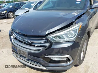 2017 Hyundai Santa Fe 2.4L z VIN 5XYZU3LB4HG462058, wystawiony jako IAAI lot #41861190 z przebiegiem 87 102 mil mil oraz . Historia ofert i sprzedaży dostępna na DreamBid. Obrazek 6.