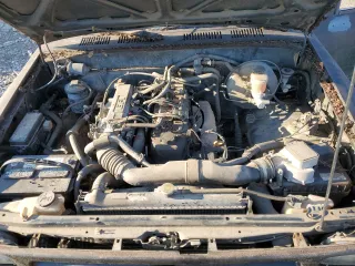 1993 Toyota Pickup z VIN 4TARN81A6PZ114634, wystawiony jako Copart lot #53115865 z przebiegiem 161 536 mil mil oraz Szkoda całkowita • Salvage title. Historia ofert i sprzedaży dostępna na DreamBid. Obrazek 11.