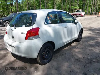 2010 Toyota Yaris with VIN JTDJT4K37A5287223, listed as a IAAI auction lot 42150919 with 196,064 mi miles. Bid and sale history available at carsss.com. Image 4.