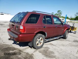2003 Isuzu Rodeo z VIN 4S2DM58W634305399, wystawiony jako Copart lot #55258335 z przebiegiem 223 105 mil mil oraz Szkody całkowita. Historia ofert i sprzedaży dostępna na DreamBid. Obrazek 3.