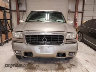 1999 Cadillac Escalade z VIN 1GYEK13RXXR413480, wystawiony jako IAAI lot #41552688 z przebiegiem 214 501 mil mil oraz . Historia ofert i sprzedaży dostępna na DreamBid. Obrazek 12.