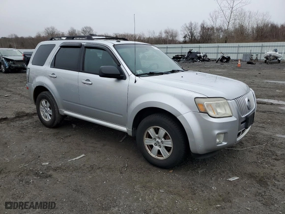 2011 Mercury Mariner with VIN 4M2CN9BG1BKJ01319, listed as a Copart auction lot 48155815 with 130,906 mi miles and Non Repairable. Bid and sale history available at carsss.com. Image 4.