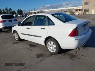 2007 Ford Focus S with VIN 1FAHP34N67W244433, listed as a IAAI auction lot 41539078 with 107,318 mi miles and . Bid and sale history available at DreamBid. Image 3.