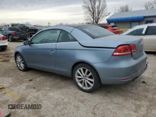 2013 Volkswagen Eos Komfort с VIN WVWBW8AH4DV001042, выставлен на аукционе Copart как лот 49492745 с пробегом 119 825 миль миль и Списание • Salvage title. История ставок и продаж доступна на DreamBid. Изображение 2.