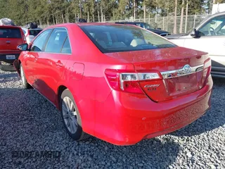 2014 Toyota Camry L with VIN 4T4BF1FK7ER356016, listed as a IAAI auction lot 41997772 with 124,962 mi miles. Bid and sale history available at carsss.com. Image 3.