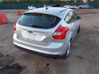 2013 Ford Focus SE with VIN 1FADP3K26DL350210, listed as a IAAI auction lot 41822980 with 124,569 mi miles and . Bid and sale history available at carsss.com. Image 4.
