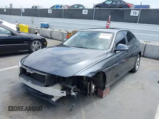 2014 BMW 3 Series 320i xDrive with VIN WBA3C3C58EP661414, listed as a IAAI auction lot 42489010 with 93,488 mi miles and . Bid and sale history available at DreamBid. Image 18.