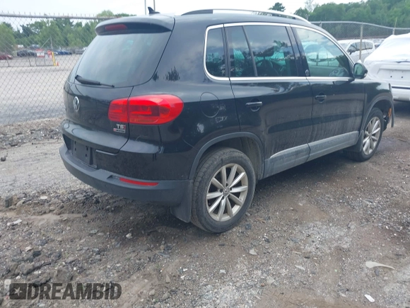 2017 Volkswagen Tiguan Wolfsburg Edition with VIN WVGSV7AX3HK037795, listed as a IAAI auction lot 42497812 with 86,211 mi miles and . Bid and sale history available at DreamBid. Image 4.