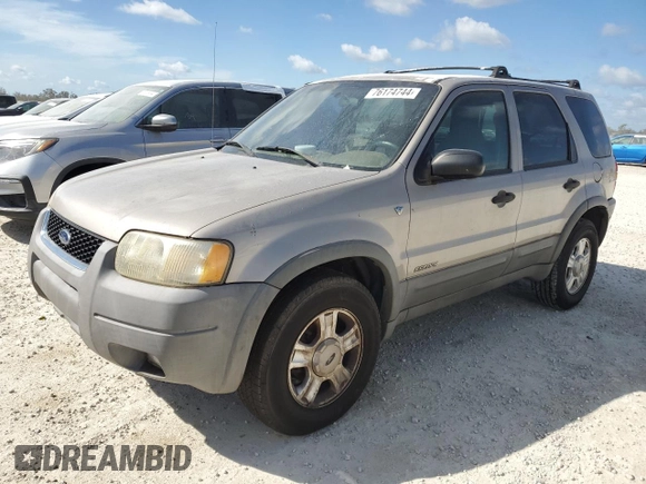 2001 Ford Escape XLT with VIN 1FMCU04101KF61126, listed as a Copart auction lot 76174744 with 0 mi miles and Salvage Title. Bid and sale history available at carsss.com. Image 1.