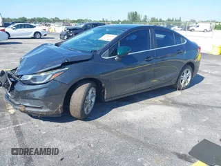 2017 Chevrolet Cruze LT with VIN 3G1BE5SM1HS566186, listed as a IAAI auction lot 42004473 with 130,158 mi miles and . Bid and sale history available at DreamBid. Image 2.