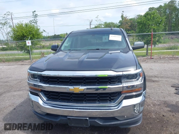 2017 Chevrolet Silverado 1500 LT with VIN 1GCRCREC4HZ298856, listed as a IAAI auction lot 42102225 with 147,501 mi miles and . Bid and sale history available at DreamBid. Image 12.