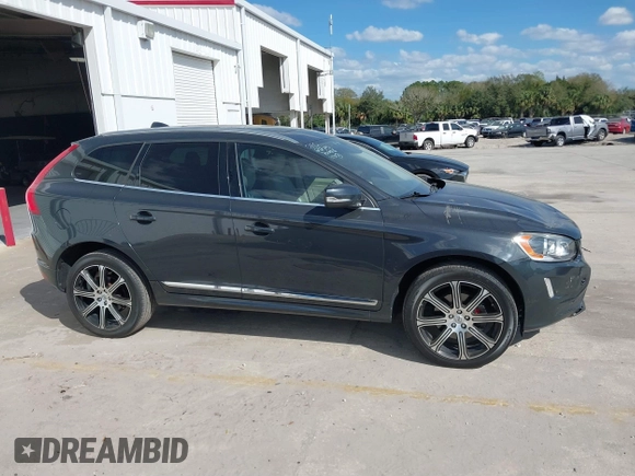 2015 Volvo XC60 T5 Drive-E Premier Plus with VIN YV440MDC7F2606774, listed as a IAAI auction lot 41564034 with 166,758 mi miles. Bid and sale history available at carsss.com. Image 13.