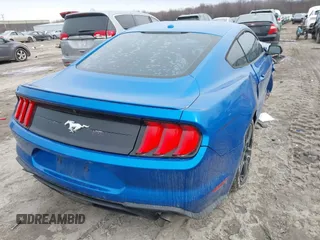 2019 Ford Mustang EcoBoost with VIN 1FA6P8TH4K5132924, listed as a IAAI auction lot 41510890 with 96,361 mi miles and . Bid and sale history available at carsss.com. Image 4.