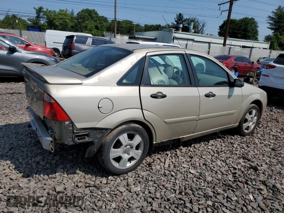 2006 Ford Focus S z VIN 1FAFP34N96W111431, wystawiony jako Copart lot #59478815 z przebiegiem Nie podano mil oraz Szkoda całkowita • Salvage title. Historia ofert i sprzedaży dostępna na DreamBid. Obrazek 3.