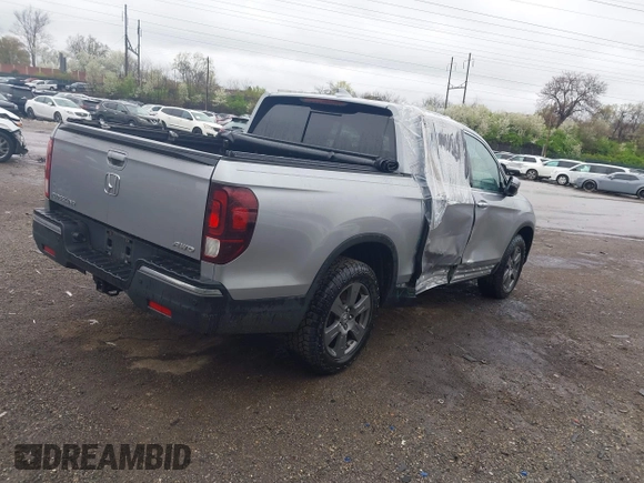 2020 Honda Ridgeline RTL-E with VIN 5FPYK3F73LB004365, listed as a IAAI auction lot 41965887 with 80,981 mi miles and . Bid and sale history available at DreamBid. Image 4.