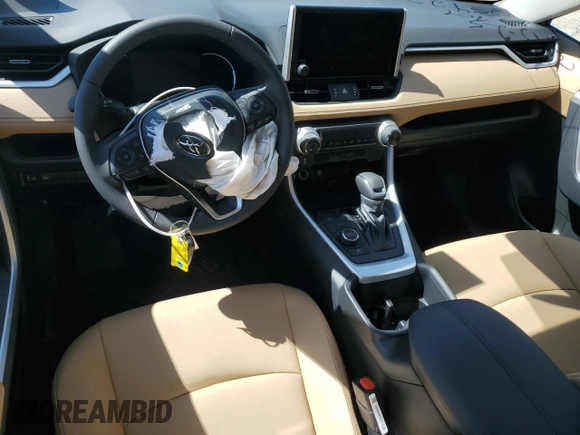 2025 Toyota RAV4 Hybrid XLE Premium with VIN 2T3B6RFVXSW084227, listed as a Copart auction lot 48907275 with 1,692 mi miles and Salvage Title. Bid and sale history available at DreamBid. Image 8.