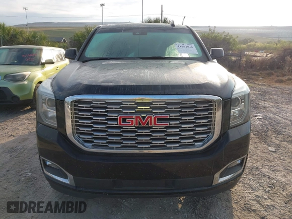 2019 GMC Yukon XL Denali with VIN 1GKS2HKJ2KR226275, listed as a IAAI auction lot 41552828 with 82,069 mi miles. Bid and sale history available at carsss.com. Image 13.