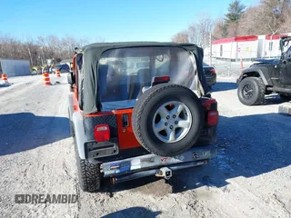 2006 Jeep Wrangler SE with VIN 1J4FA29S16P712101, listed as a IAAI auction lot 41347042 with 129,063 mi miles. Bid and sale history available at carsss.com. Image 16.