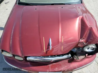 2004 Jaguar X-Type with VIN SAJEA51CX4WD60022, listed as a Copart auction lot 70491824 with 121,443 mi miles and Salvage Title. Bid and sale history available at carsss.com. Image 12.