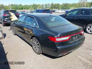 2017 Lincoln Continental Livery z VIN 1LN6L9HK3H5606334, wystawiony jako IAAI lot #42231351 z przebiegiem 247 841 mil mil oraz . Historia ofert i sprzedaży dostępna na DreamBid. Obrazek 3.