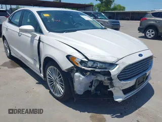 2014 Ford Fusion SE Hybrid with VIN 3FA6P0LUXER233658, listed as a IAAI auction lot 42311588 with 106,282 mi miles and . Bid and sale history available at DreamBid. Image 6.
