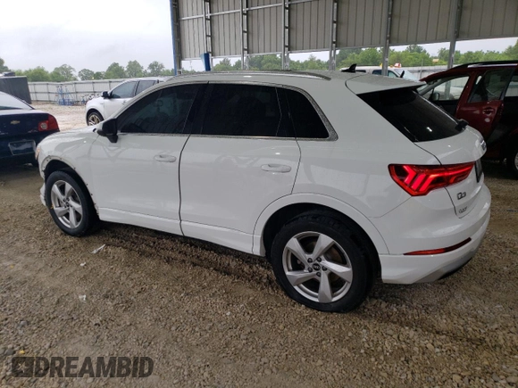 2021 Audi Q3 Premium with VIN WA1AUCF3XM1094216, listed as a Copart auction lot 58710615 with 86,743 mi miles and Salvage title. Bid and sale history available at DreamBid. Image 2.