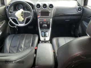 2014 Chevrolet Captiva Sport LTZ with VIN 3GNAL4EK7ES547027, listed as a Copart auction lot 48810375 with 77,306 mi miles and Salvage Title. Bid and sale history available at DreamBid. Image 8.